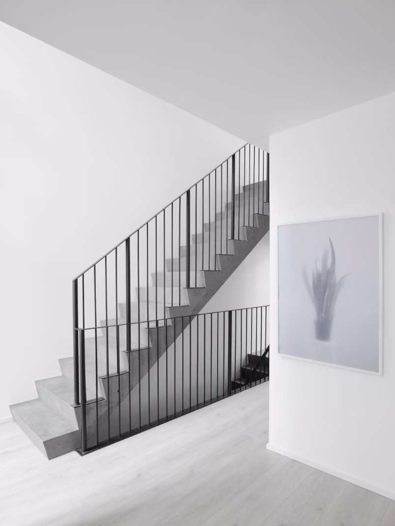 How do paints and coatings affect indoor air quality in green buildings?