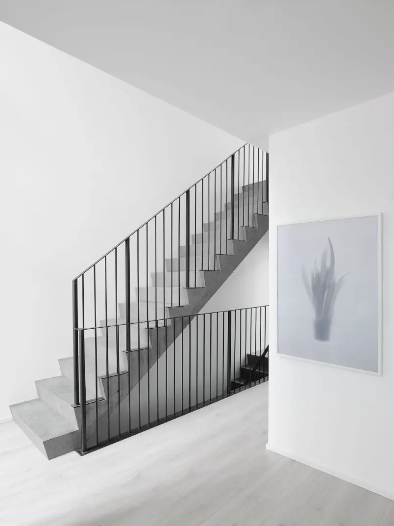 How do paints and coatings affect indoor air quality in green buildings?