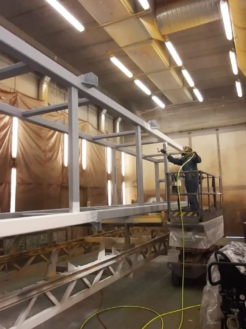 Person spraying paint