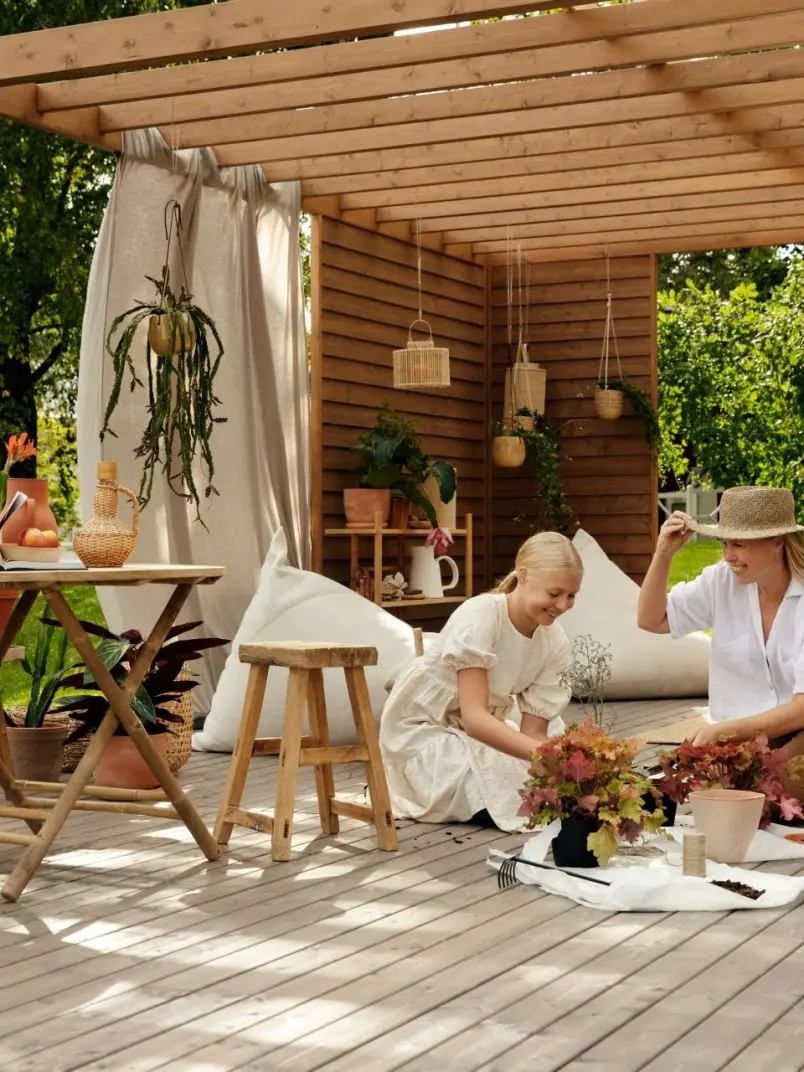 family pergola decorated with neutral colour and plants