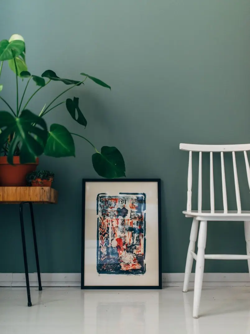 green wall with chair