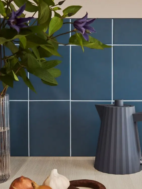kitchen backsplash tiles painted with dark blue colour