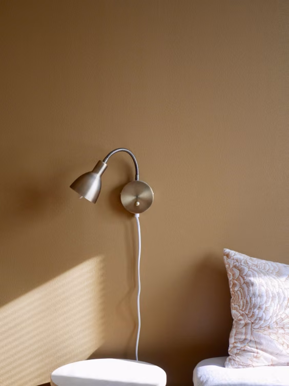 brown colour wall in bedroom