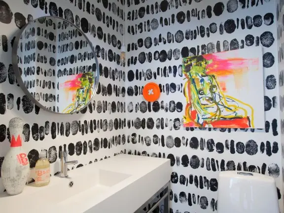 black-and-white decorative pattern on the walls of guest WC