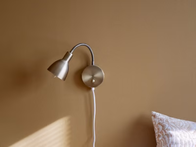 brown colour wall in bedroom