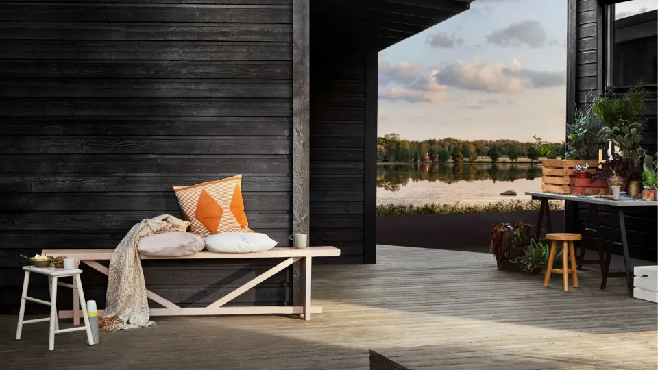 Dark wooden house with terrace