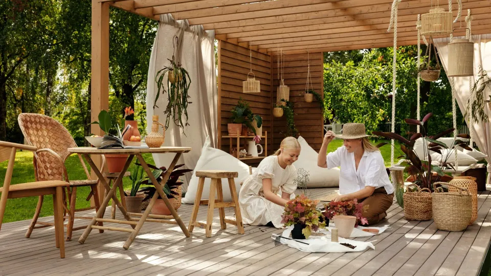 family pergola decorated with neutral colour and plants