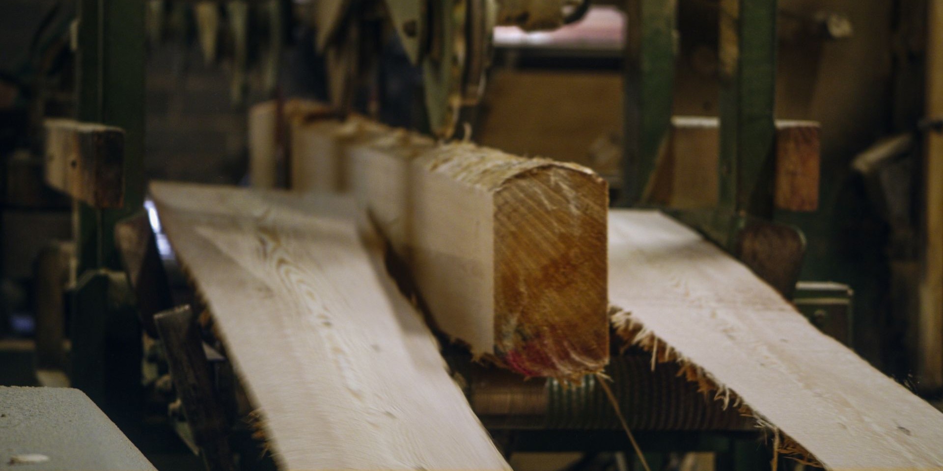 Wood being sawed