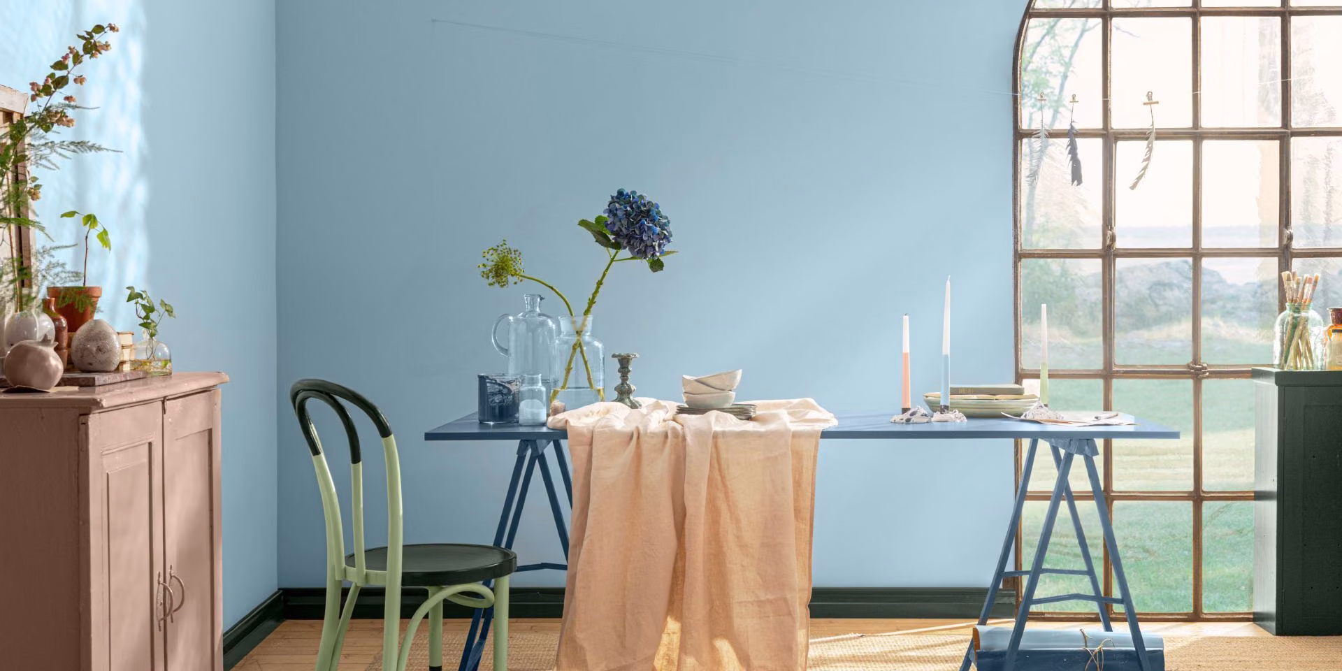 blue wall and table painted with green colours