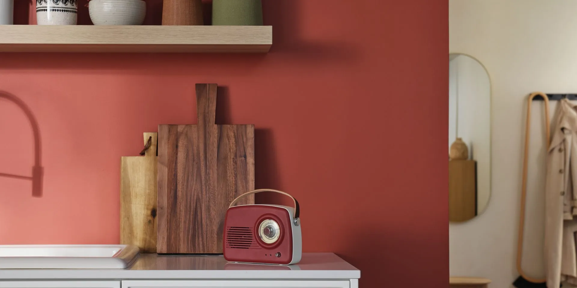 Red painted wall in kitchen