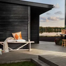 Dark wooden house with terrace