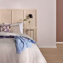 wooden headboard in bedroom