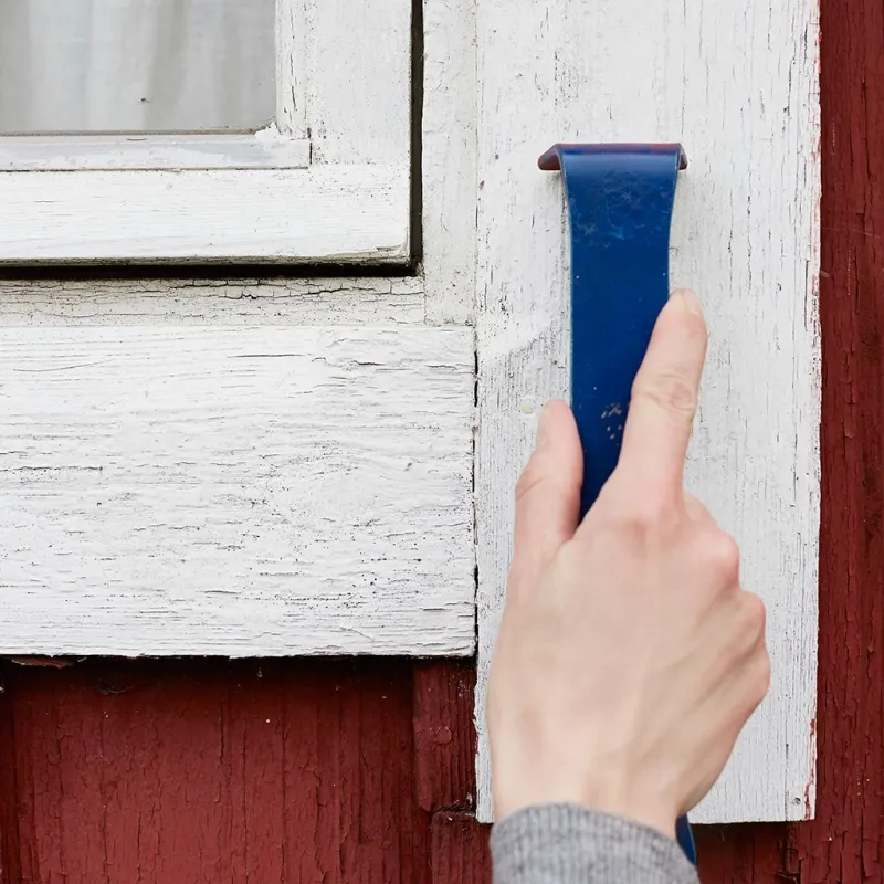 scraping old window frames