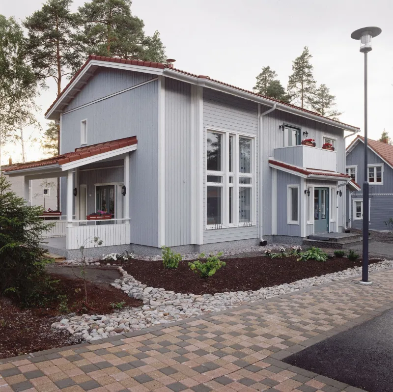 grey modern wooden house with white window frame