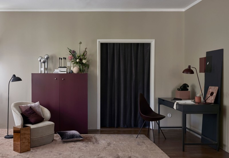 beige colour wall in living room, brown colour cabinet and table