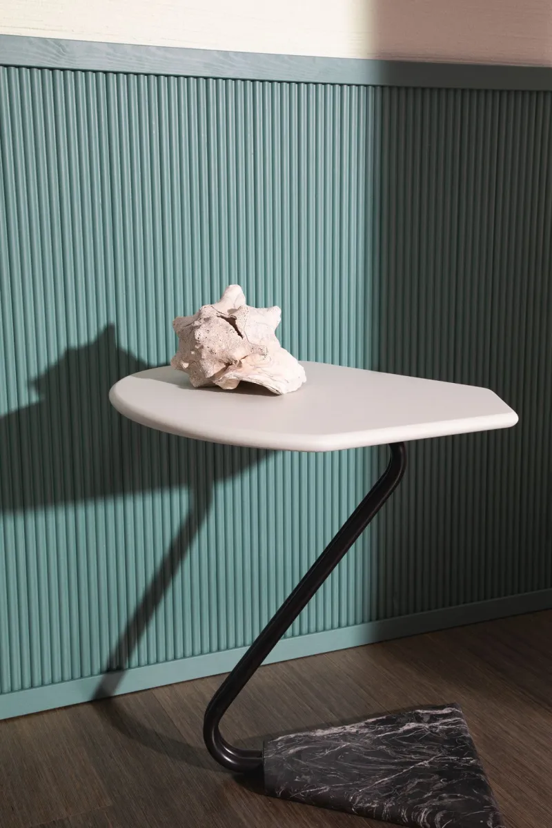 green wall panel and white stone top coffee table