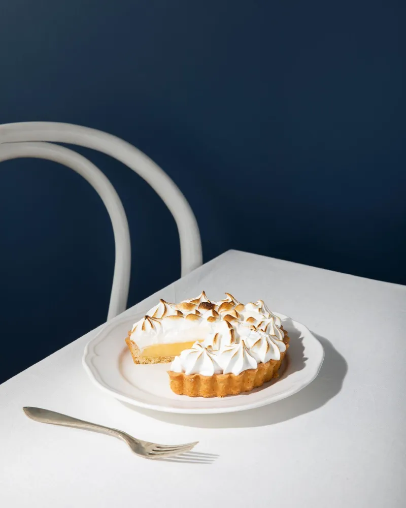 dessert table near a navy blue wall