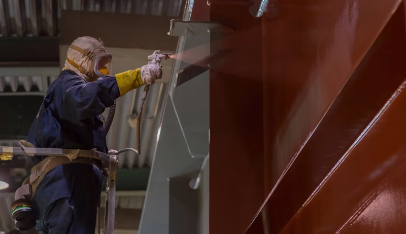 Man spraying paint