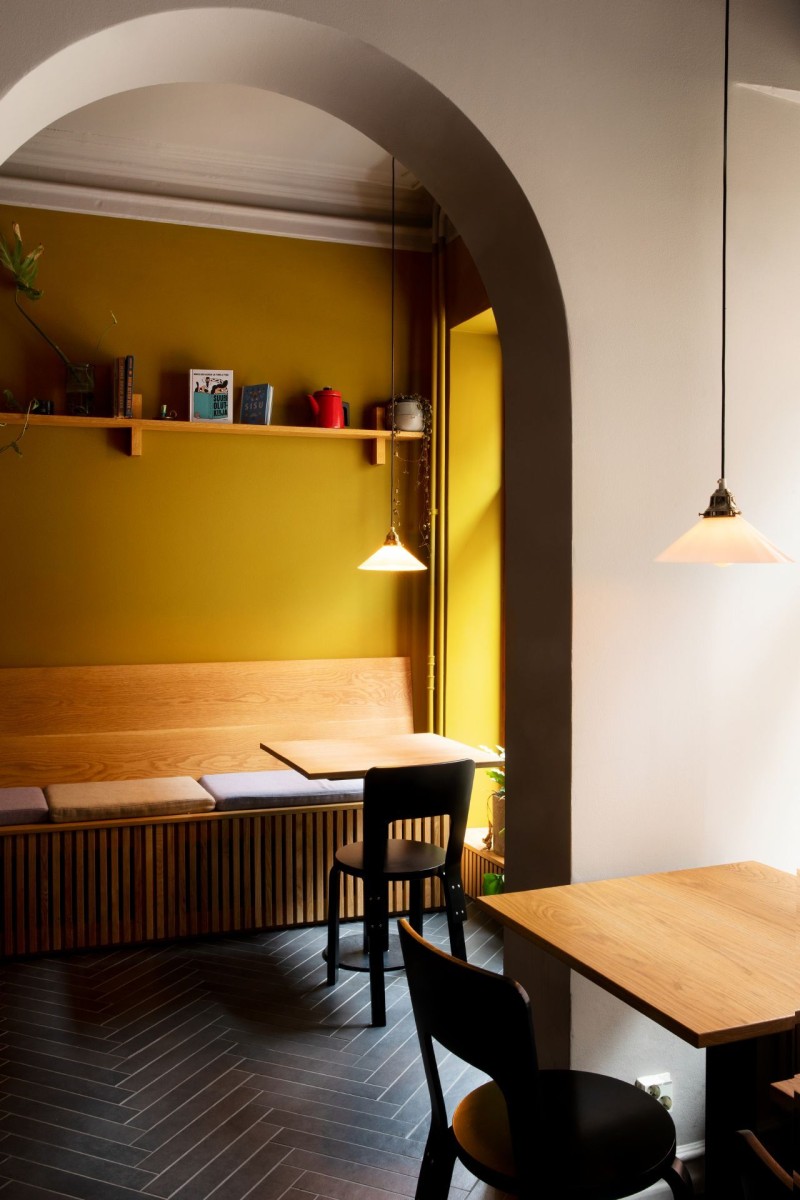 warm yellow colour background wall in cosy restaurant hall 