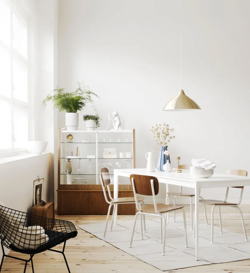 bright white dinning area with light colour furniture